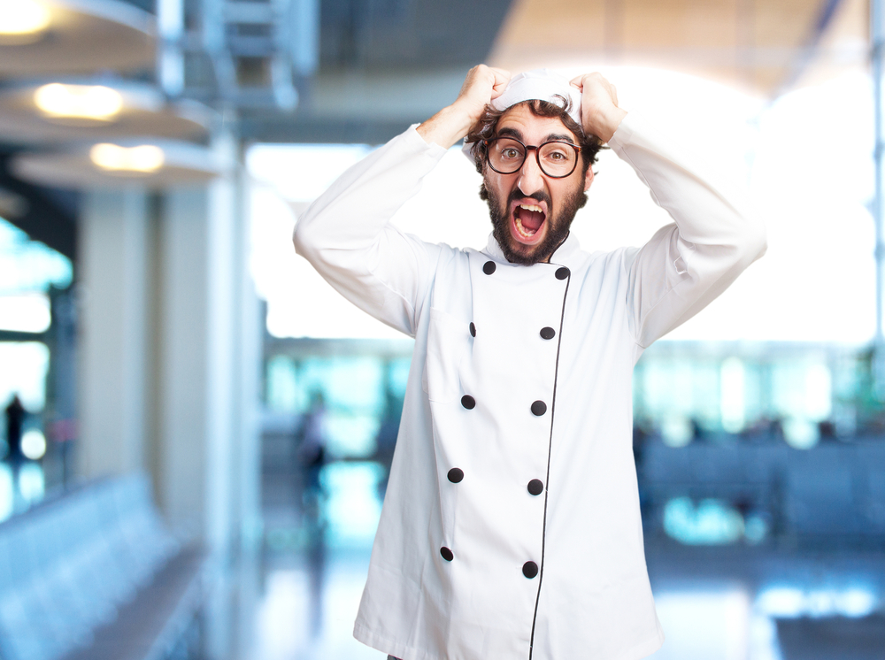 angry chef or restaurant manager yelling at the camera