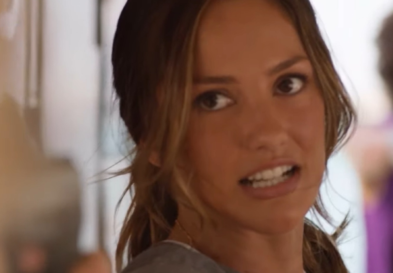 Screenshot: Minka Kelly is looking at side with upset face - from Charlie's Angels (2011 TV series)