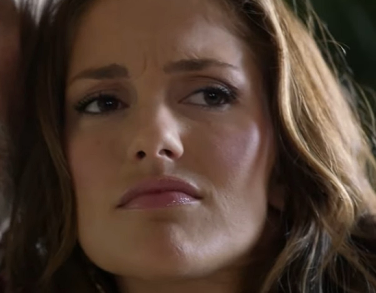 Screenshot: Minka Kelly is looking at side with sad face from - Charlie's Angels (2011 TV series)