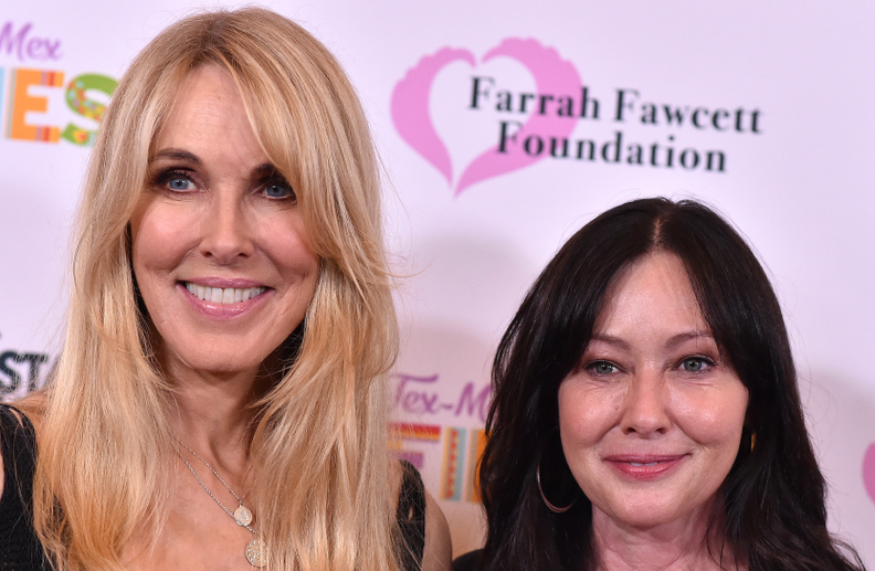 Alana Stewart and Shannen Doherty at an event looking at the camera