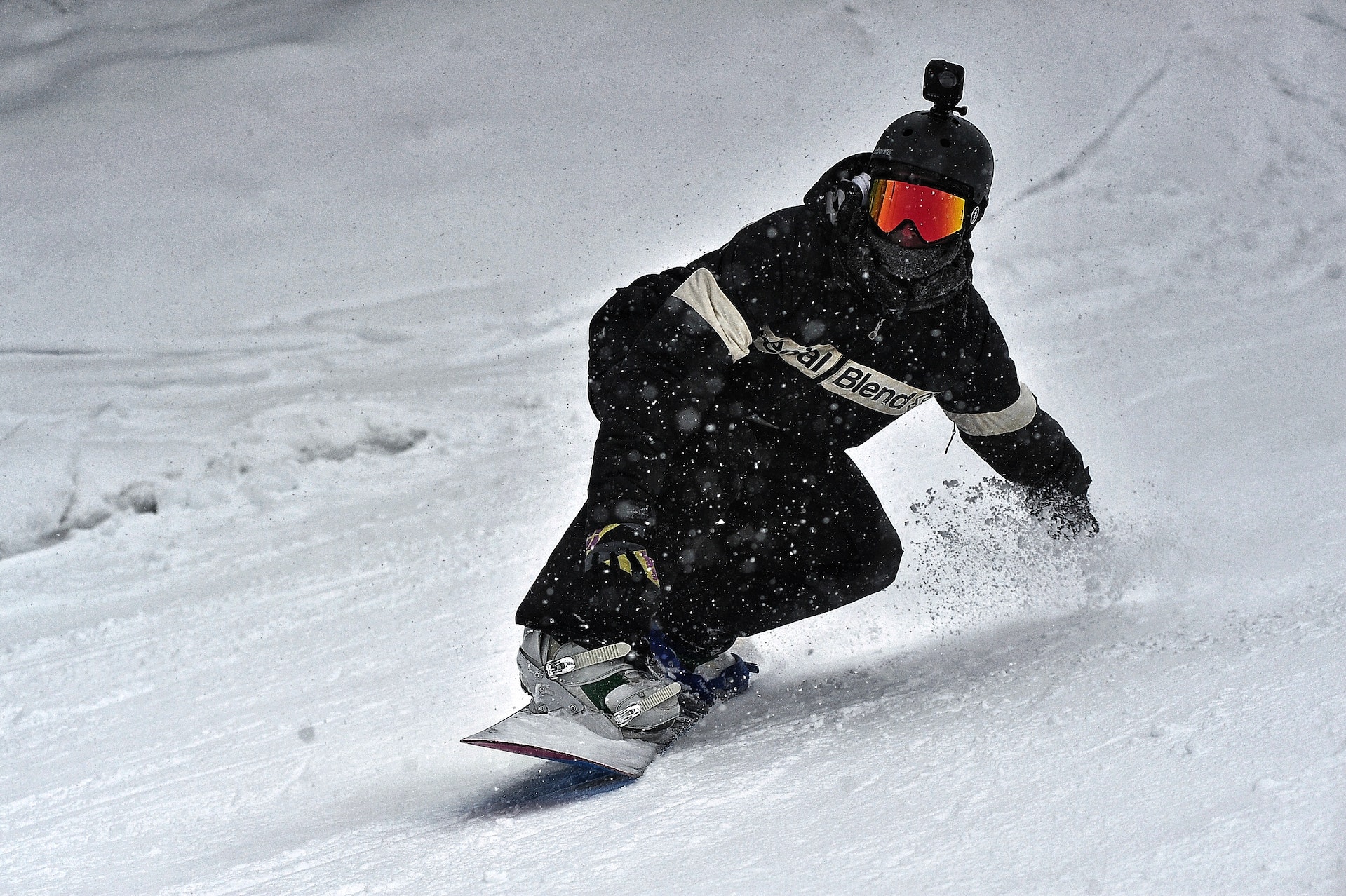 person riding on snowboard in winter on a mountain