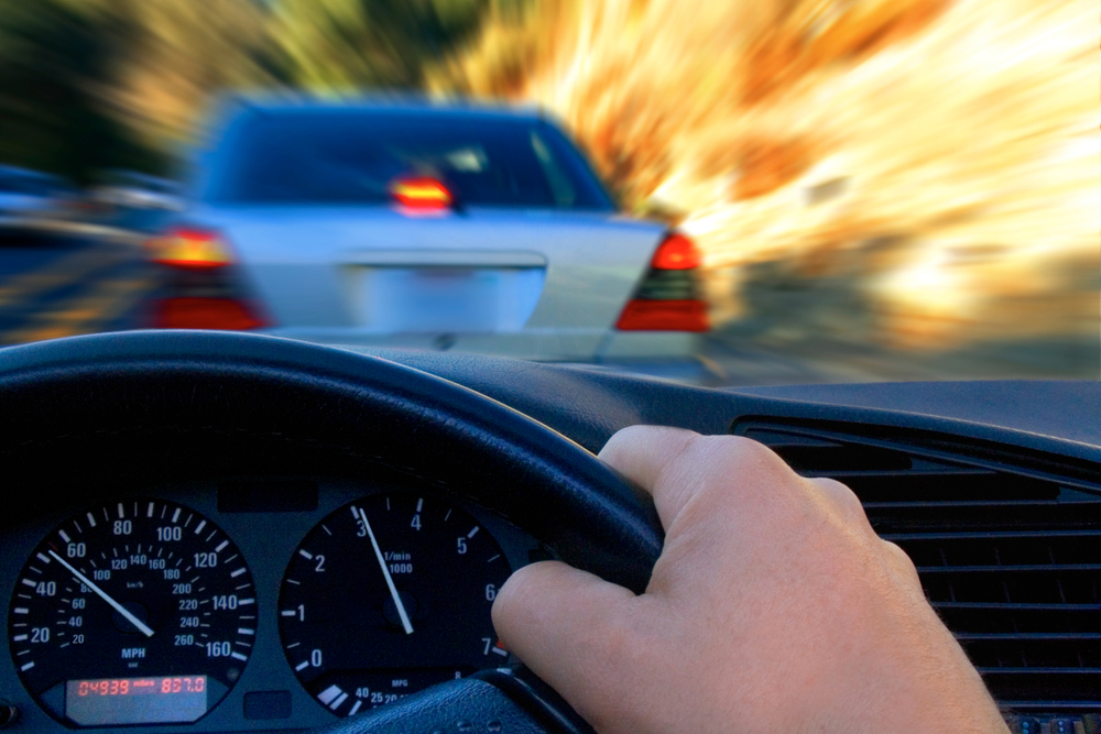 Man hitting brakes to avoid accident