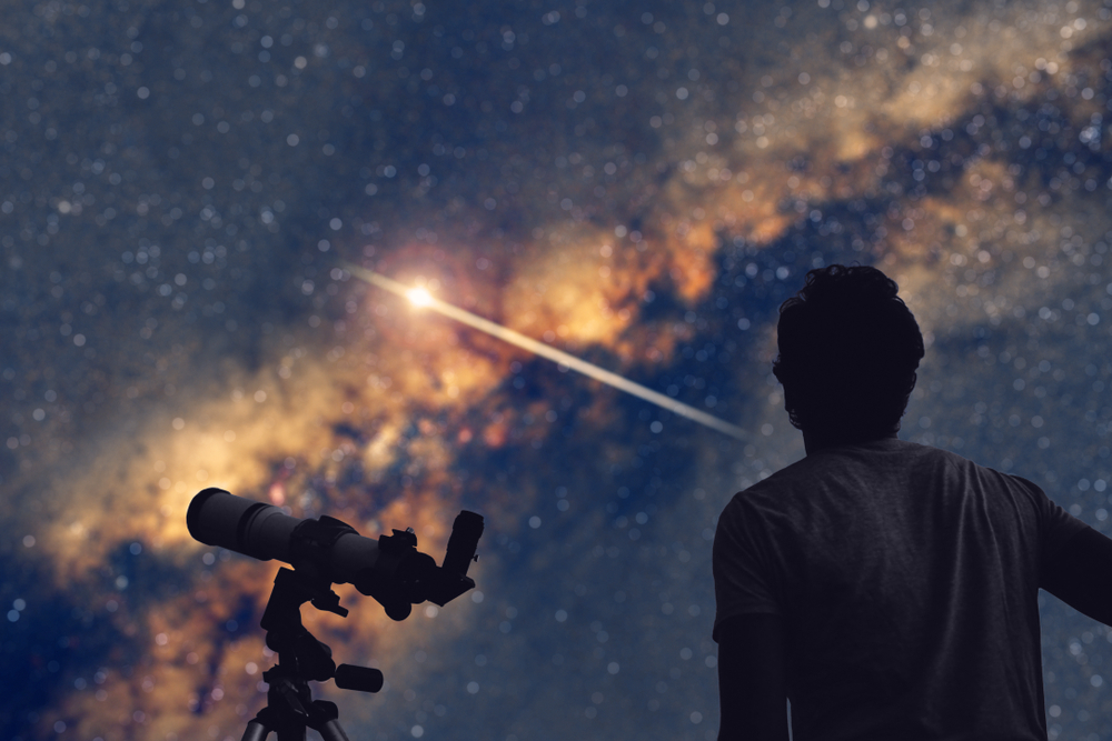 Astronomer with a telescope