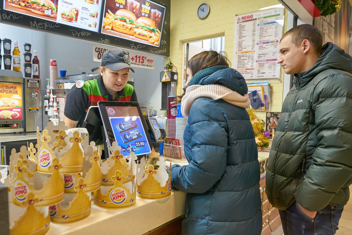 Couple are making an order to a burger king employee - 2018.