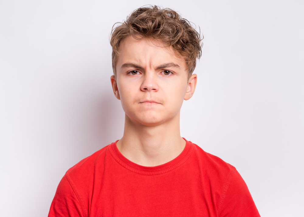 Angry Teenager looking at camera
