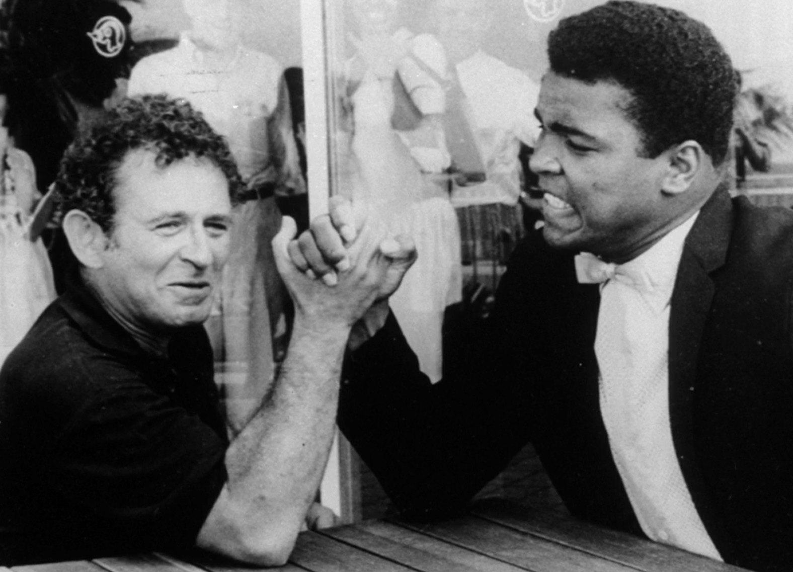 Muhammad Ali and Norman Mailer looking at the camera