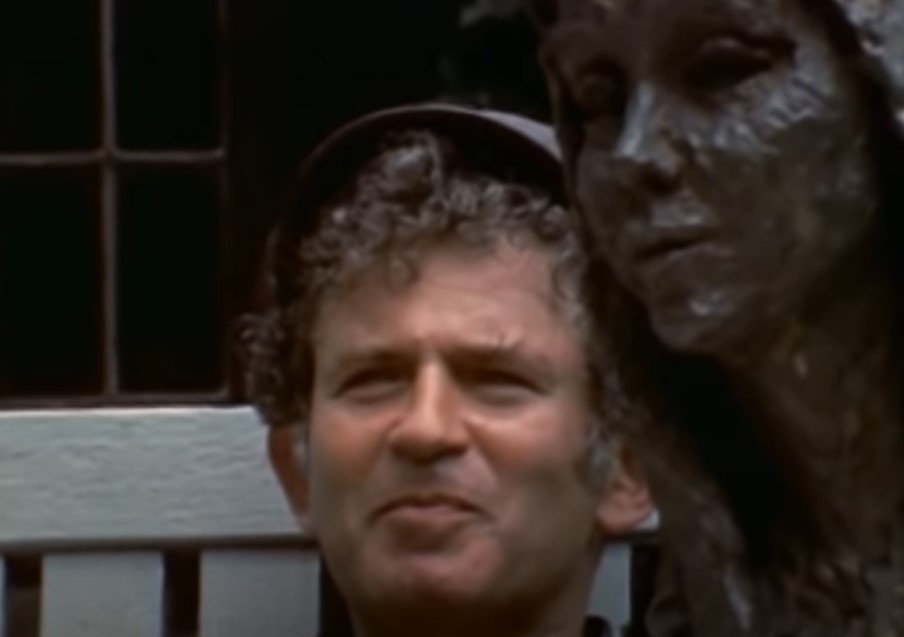 Maidstone 1970 Norman Mailer sitting on a bench