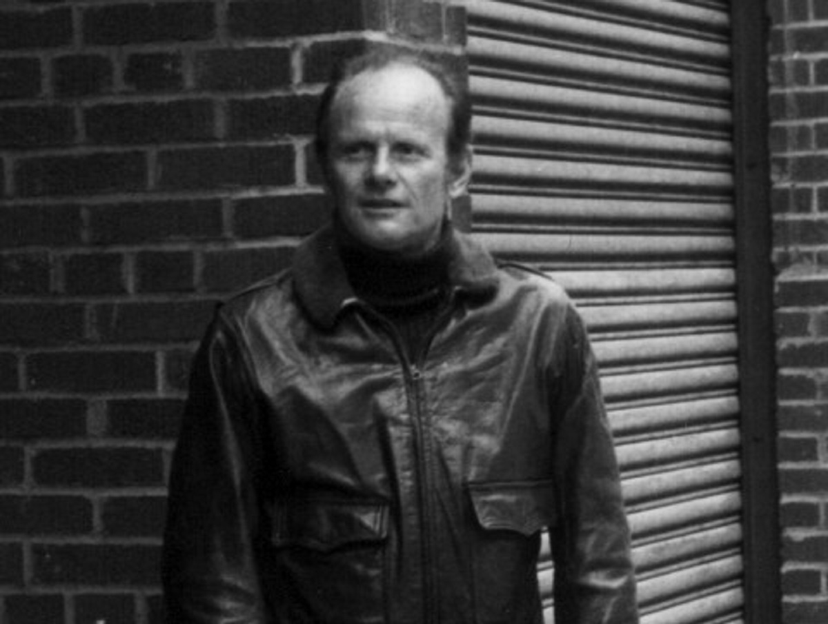 B&W photo of William Traylor wearing black jacket and looking at side - 1978