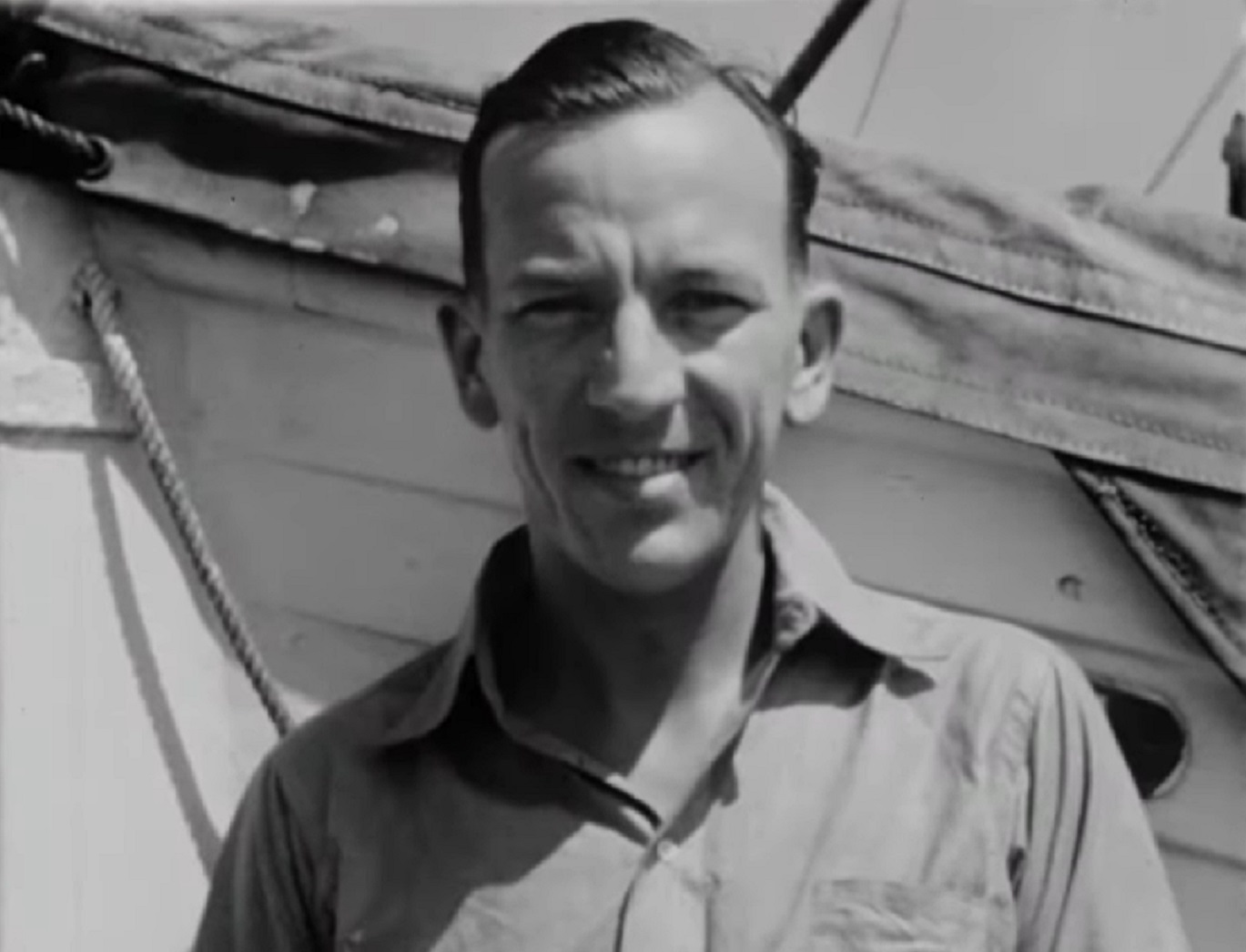 B&W Screenshot: Noel Coward is looking at front and smiling - from Mad About the Boy: The Noel Coward Story (2023)