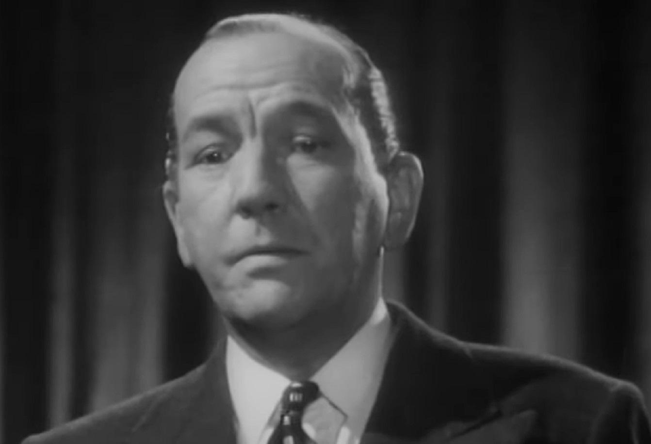 B&W Screenshot: Noel Coward is looking down - from Mad About the Boy: The Noel Coward Story (2023)