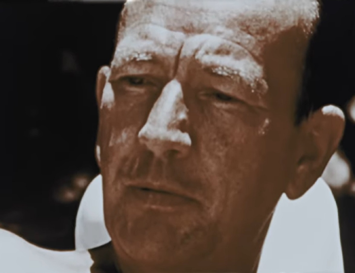 Screenshot: Noel Coward is looking down with sad face - from Mad About the Boy: The Noel Coward Story (2023)