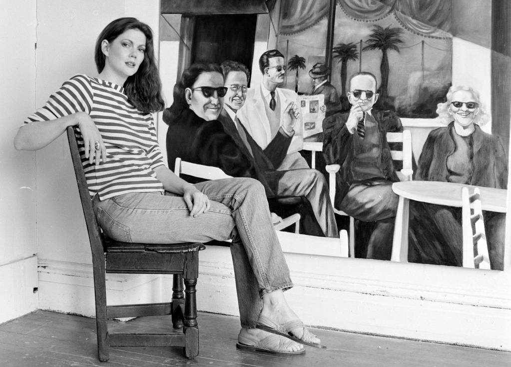 Artist Norris Church Mailer sitting on a chair