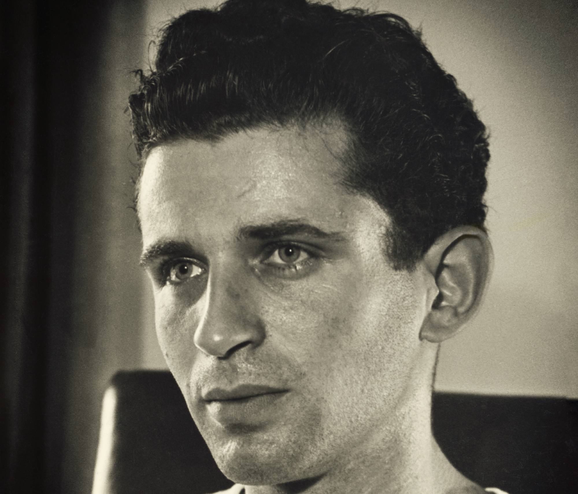 Norman Mailer as a young man looking at the camera