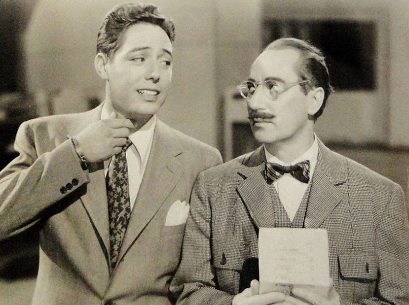 black and white photo of Groucho Marx and Andy Russell