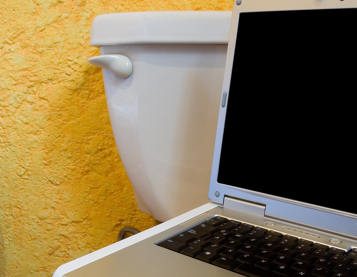 Laptop lost in public restroom.