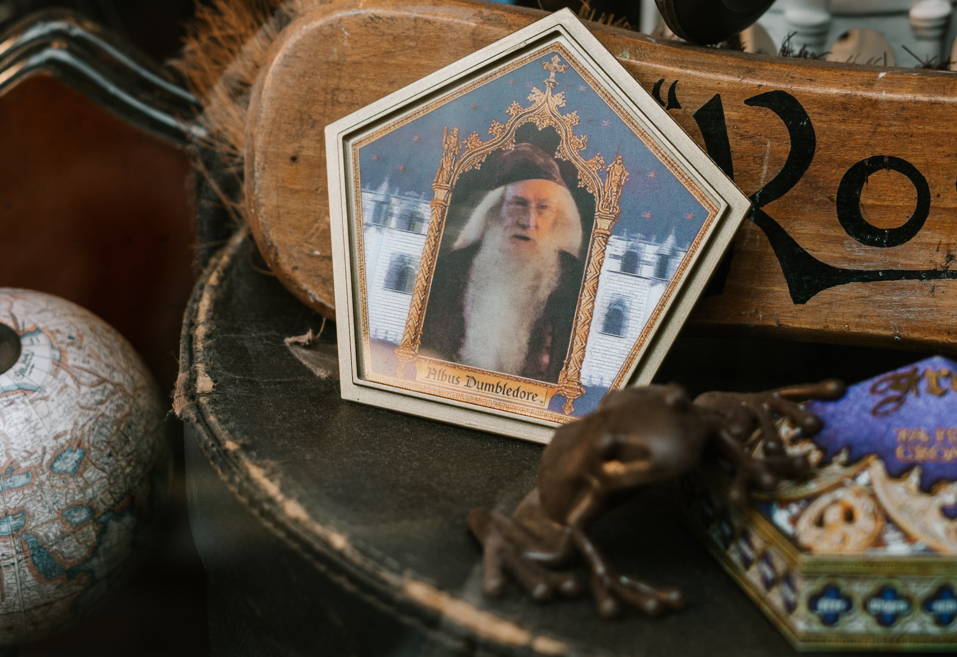 photo of dumbeldore placed on an old table