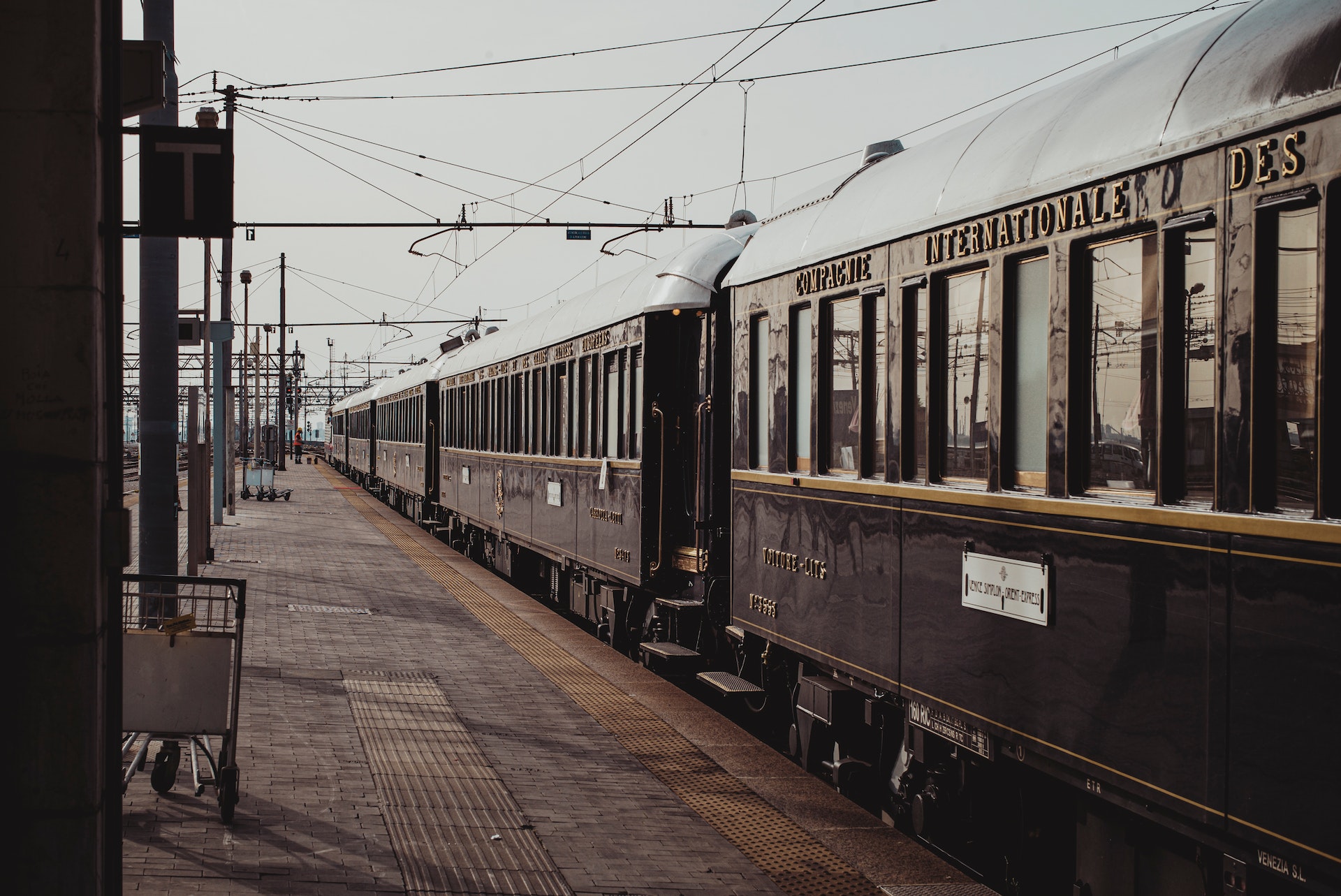 Old fashioned train parked on railroad station