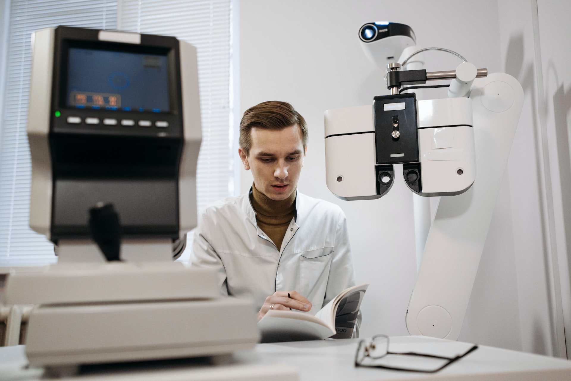ophthalmologist sitting at his office