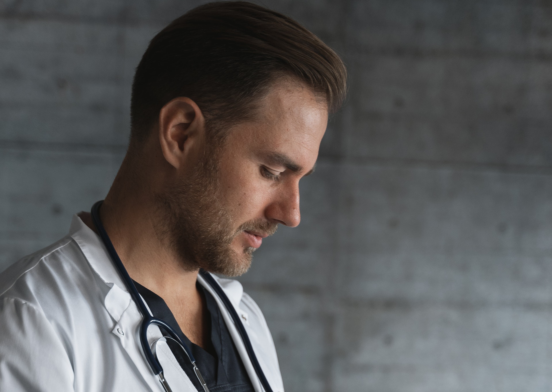 Doctor in uniform looking right from the camera