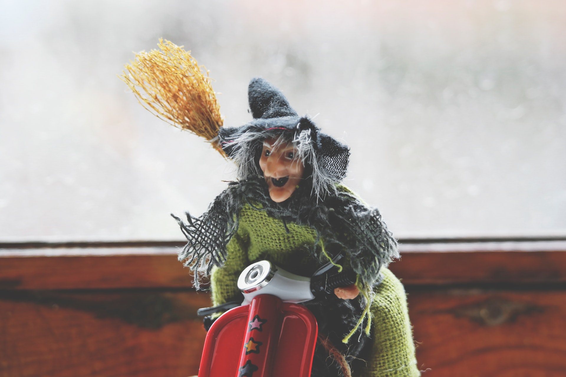 Witch Puppet Riding Motorcycle Toy