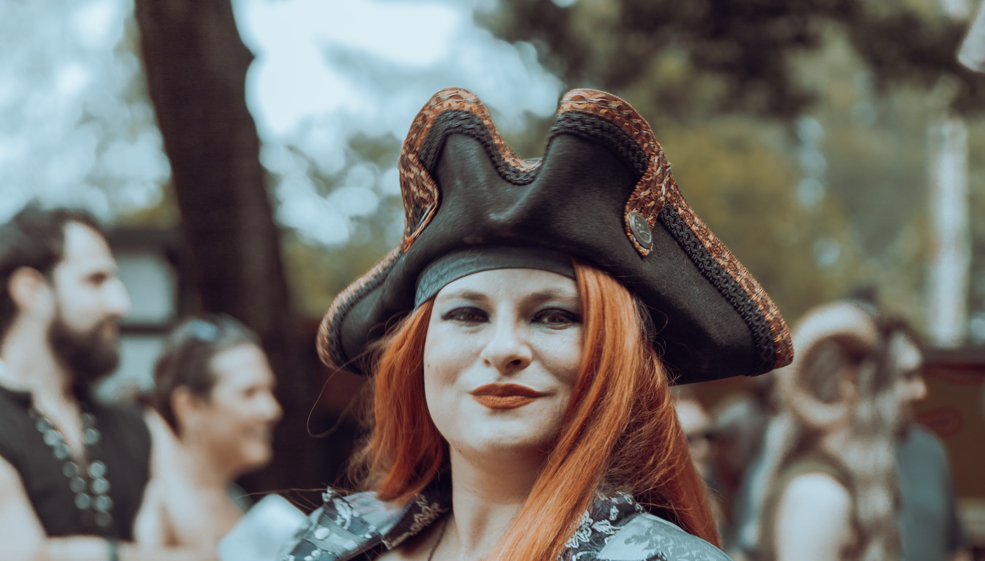Woman Posing in Pirate Costume with a pirate hat