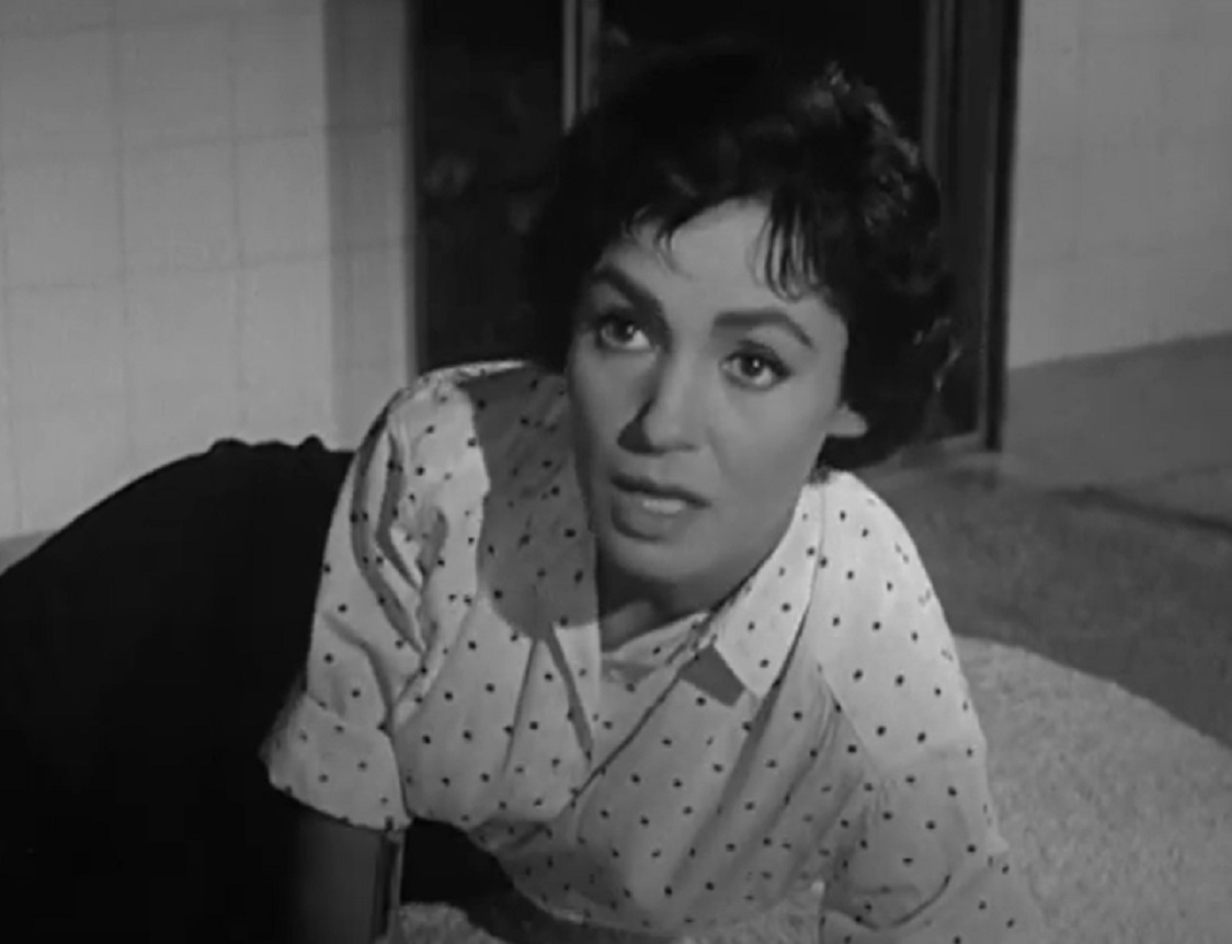 Screenshot: Susan Cabot is looking shocked - from Sorority Girl (1957).