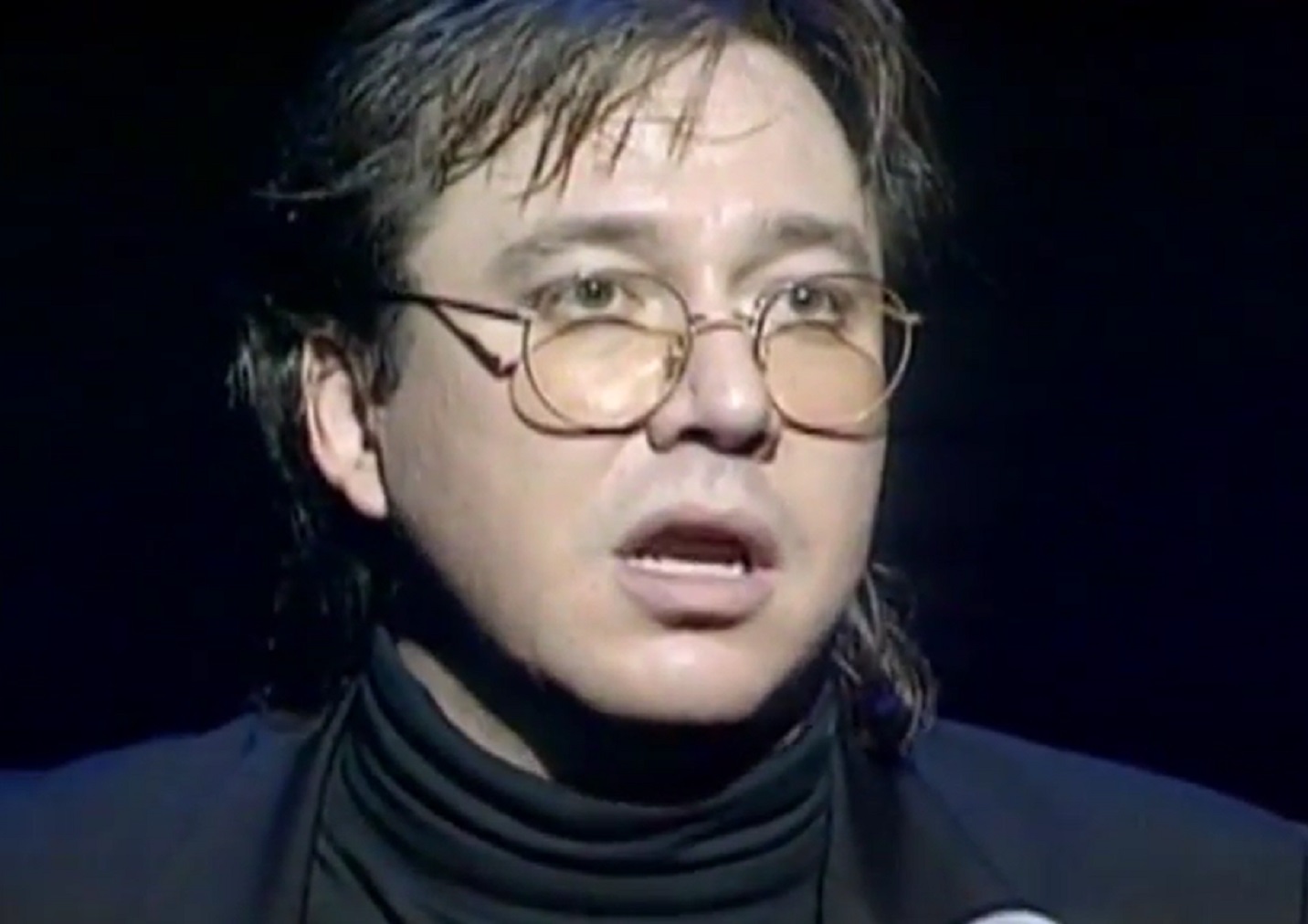 Screenshot: Bill Hicks is looking surprised at camera - from American- The Bill Hicks Story (2009)