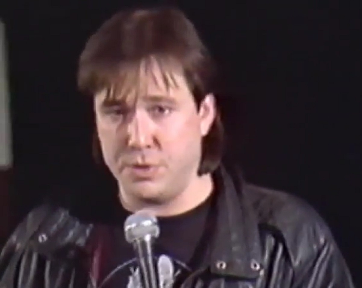 Screenshot: Bill Hicks is performing on stage - from American- The Bill Hicks Story (2009)