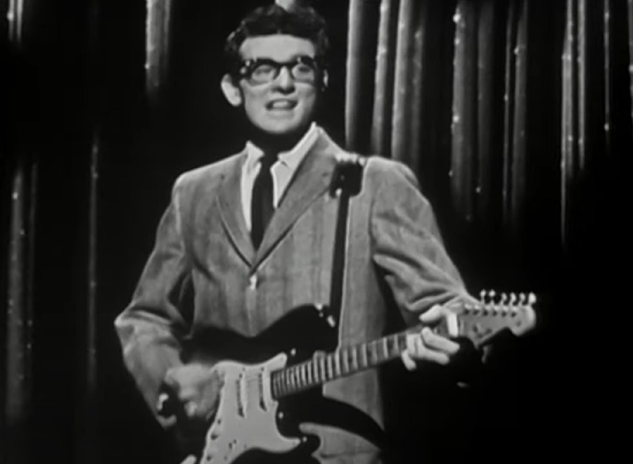 Buddy Holly playing at guitar on stage - The Ed Sullivan Show (1948-1971)