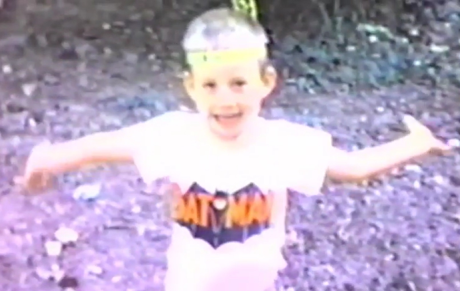 Screenshot: Bill Hicks as young kid is playing outside - from American- The Bill Hicks Story (2009)