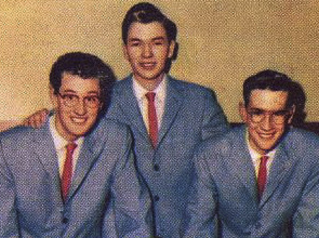 Buddy Holly And The Crickets are smiling at camera - 1957