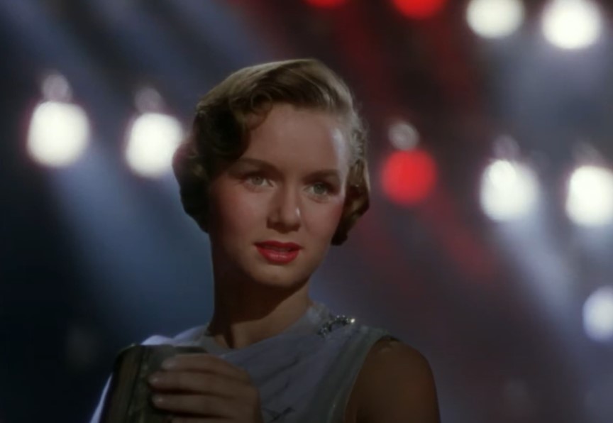 Debbie Reynolds in Singin' in the Rain looking at the camera