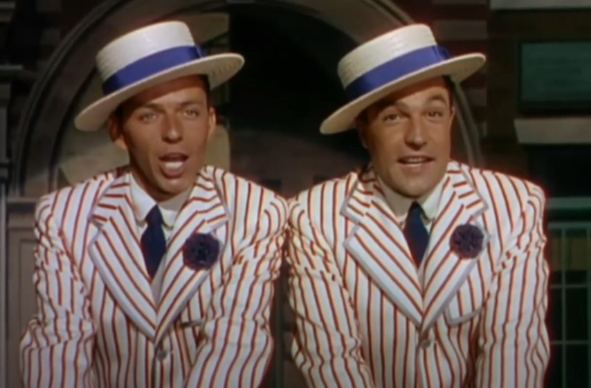 Frank Sinatra, Gene Kelly in take me out to the ball  game  dancing and looking at the camera