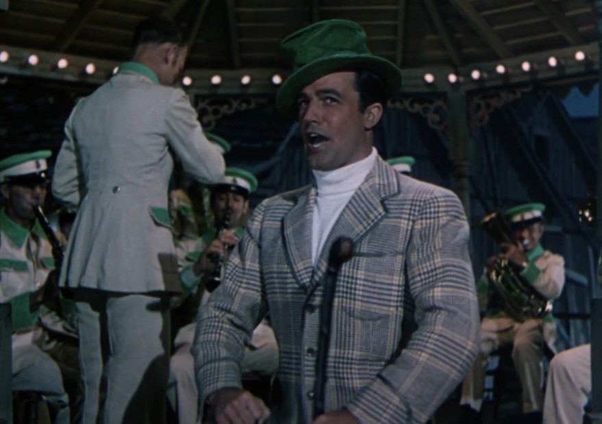 Gene Kelly in Take Me Out to the Ball Game wearing a plaid jacket dancing