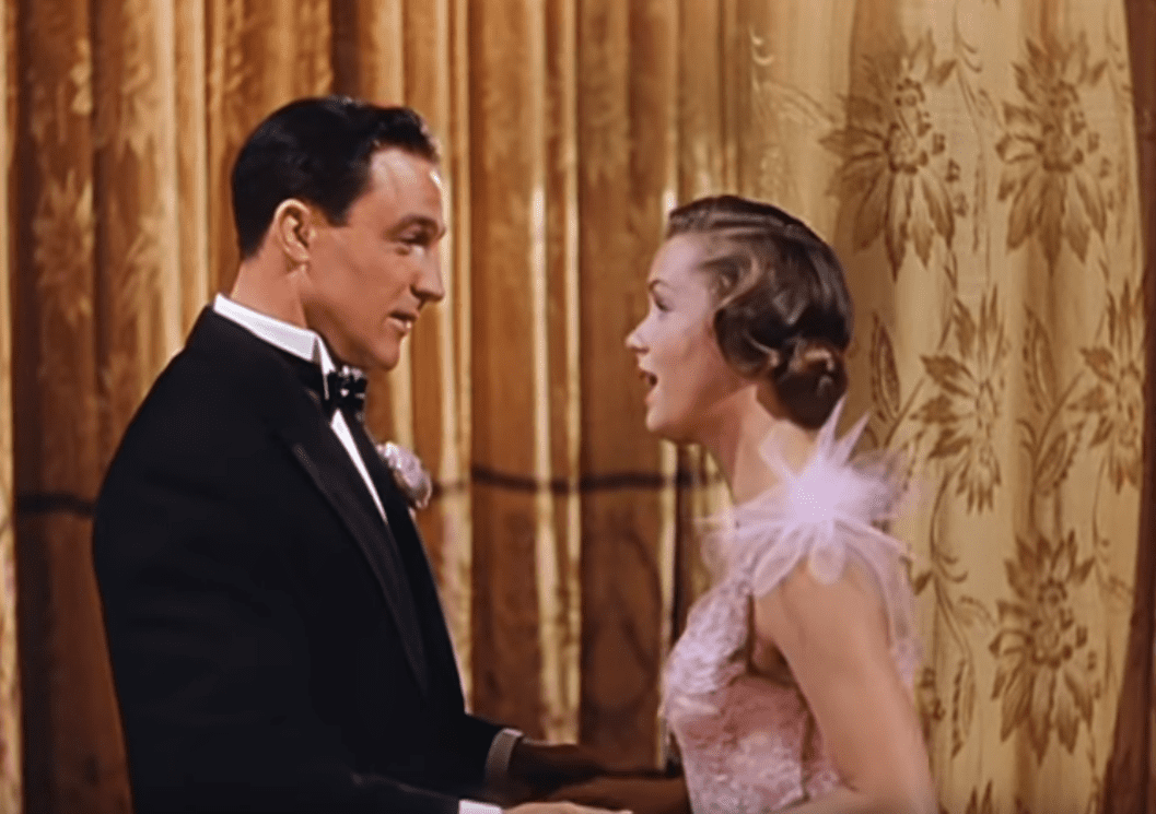 Debbie Reynolds and  Gene Kelly in Singin' in the Rain in formal clothes