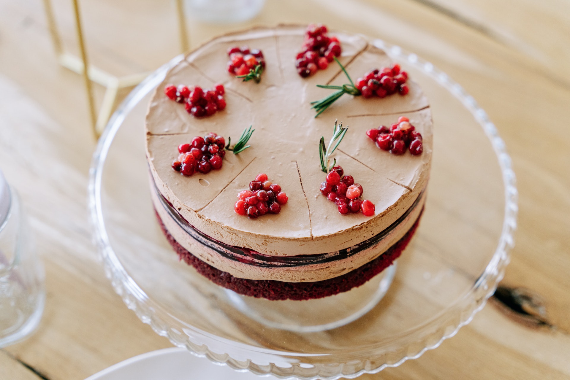 A Whole Cake with Fruits on Top on a Glass Cake Stand