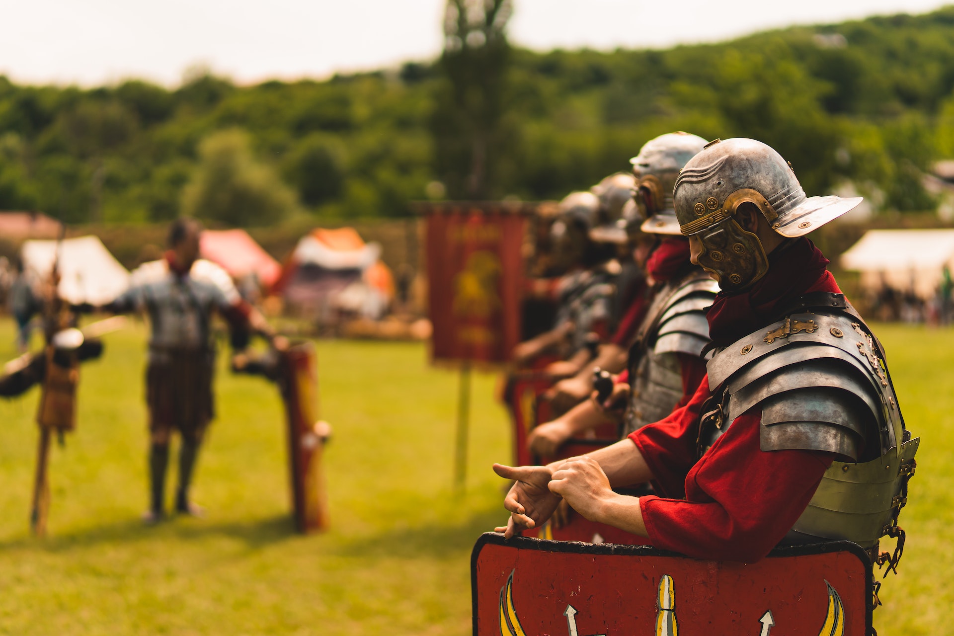 Men in Roman Legionaries Armors on a Festival