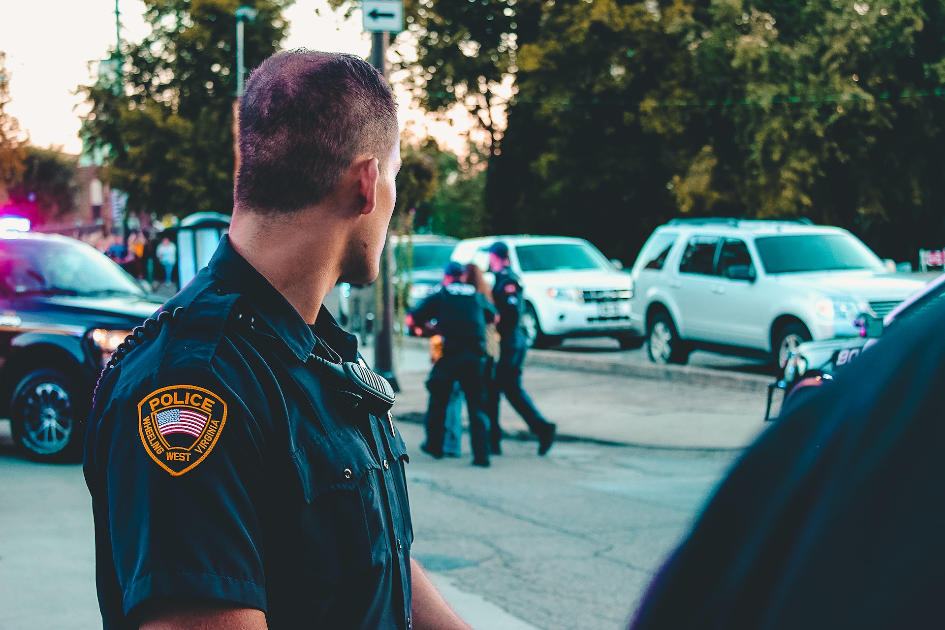 Man Wearing Black Officer Uniform with a police patch