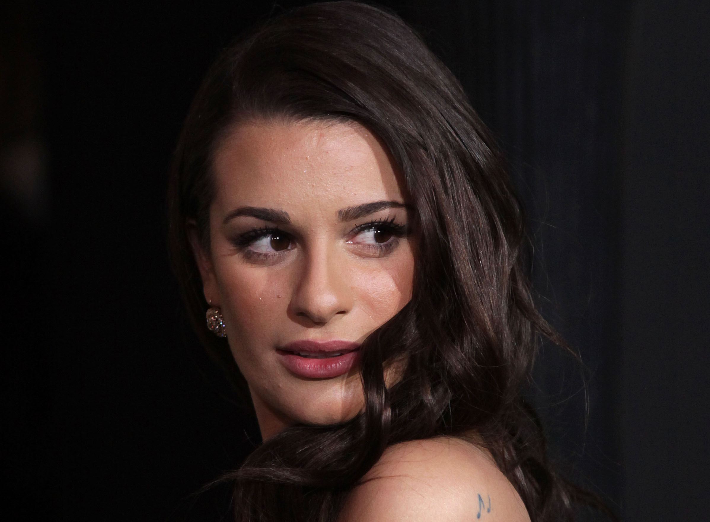 LEA MICHELE  in white top and earrings