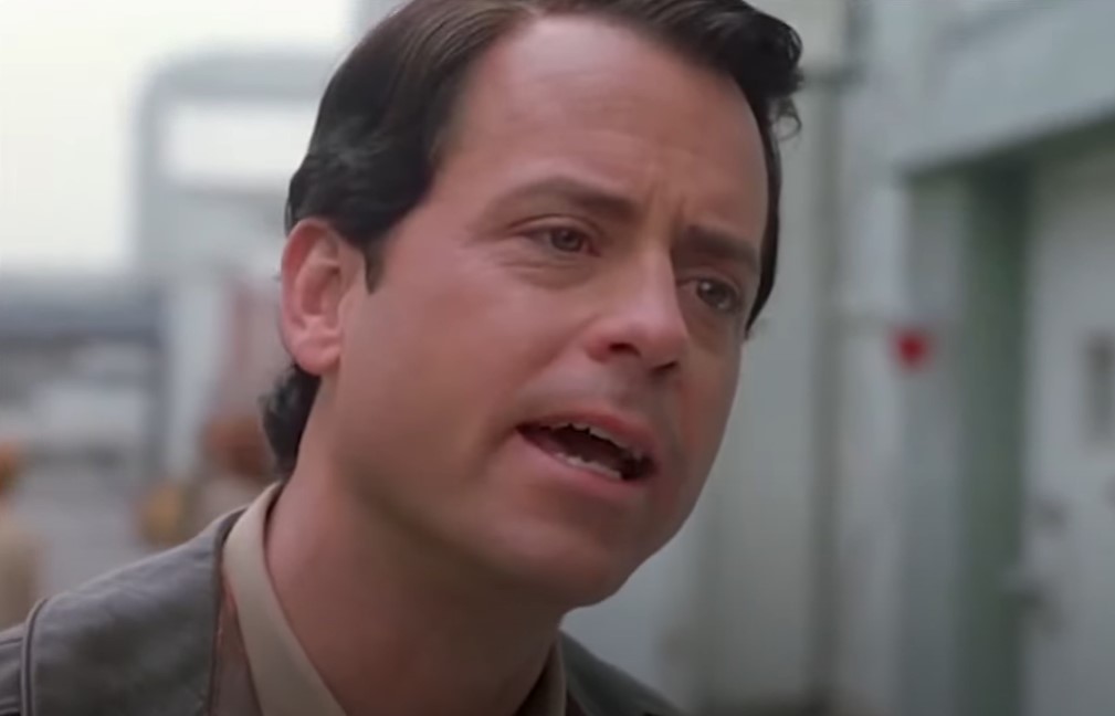 Greg Kinnear  as  Bob Crane speaking to someone