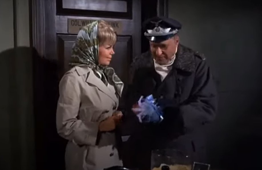 hogan's heroes Hilda  Sigrid Valdis in trench coat and head scarf