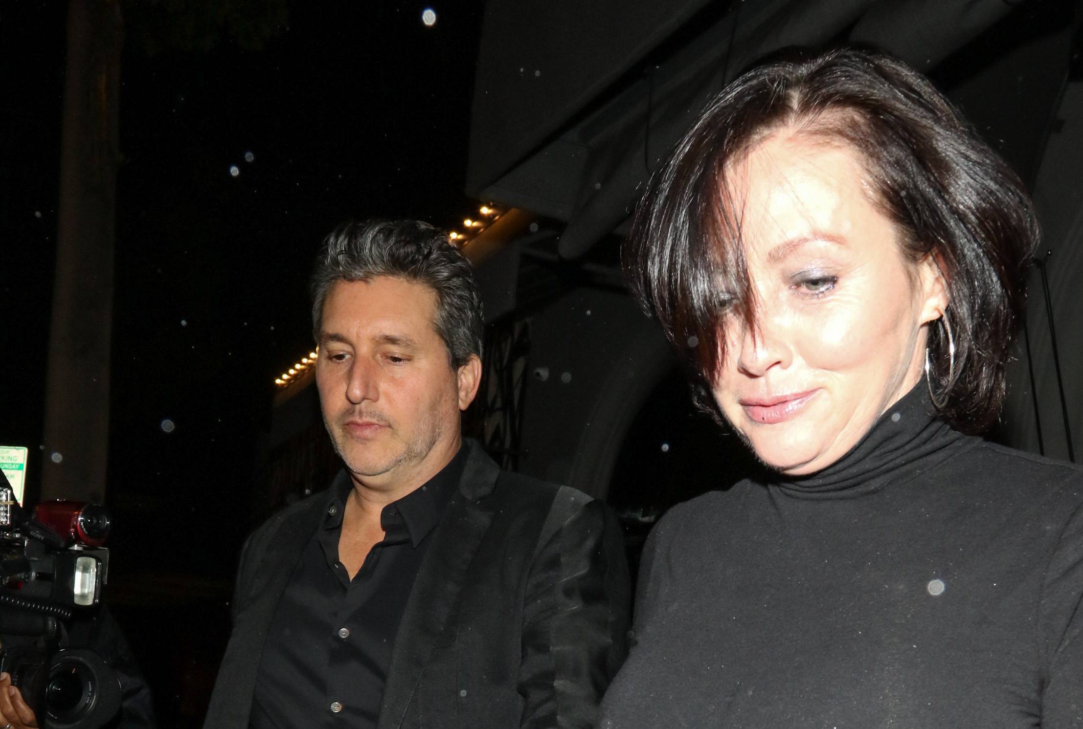 Chris Cortazzo and Shannen Doherty are seen on March 13, 2018 in Los Angeles, California in black clothes