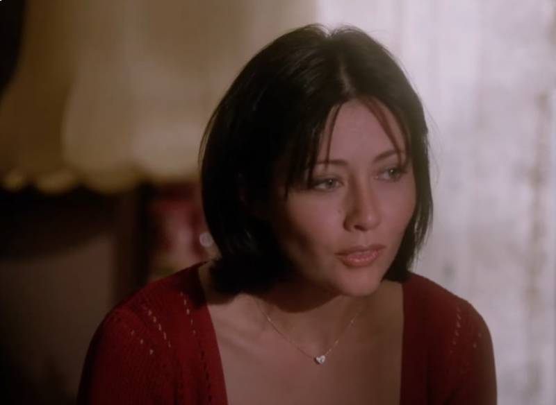 Shannen Doherty as Prue Halliwell in red sweater