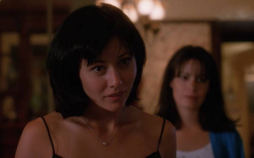 Shannen Doherty as Prue Halliwell in black top