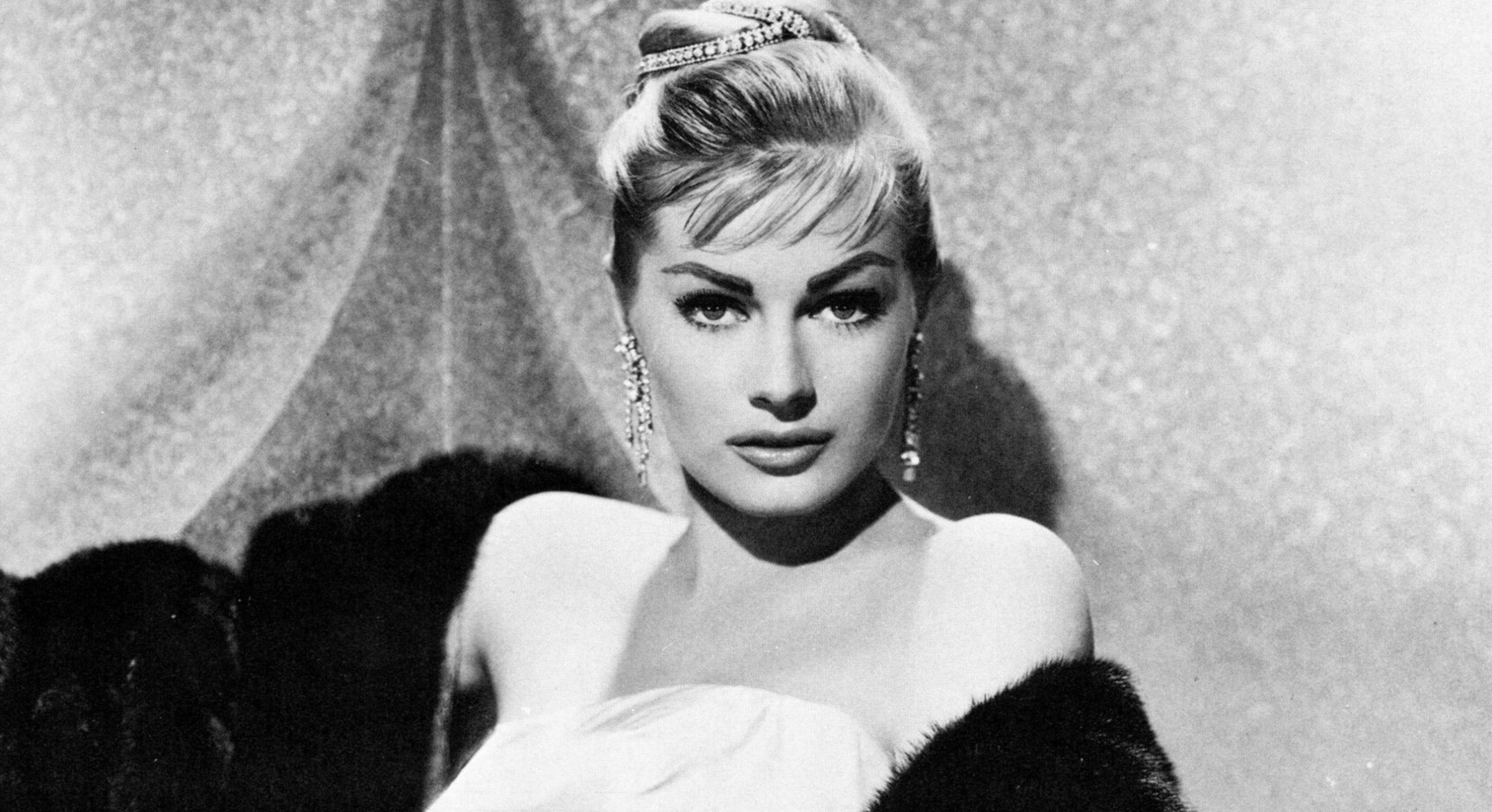 Anita Ekberg in white dress,  fur coat and  earrings