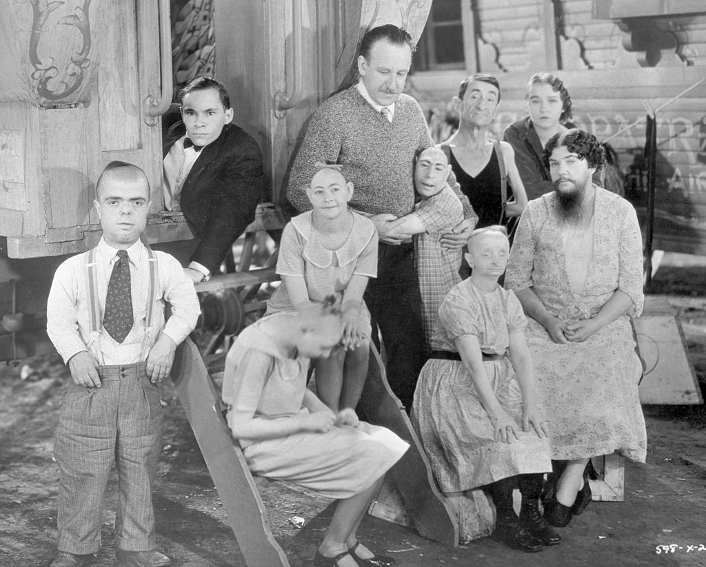 Director Tod Browning poses with cast members from his film 