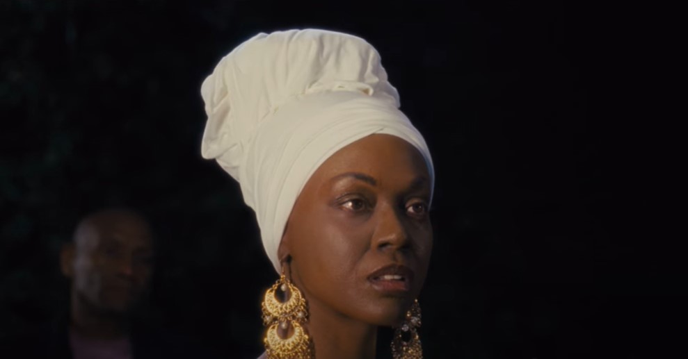 Zoe Saldana as nina simone wearing white hat