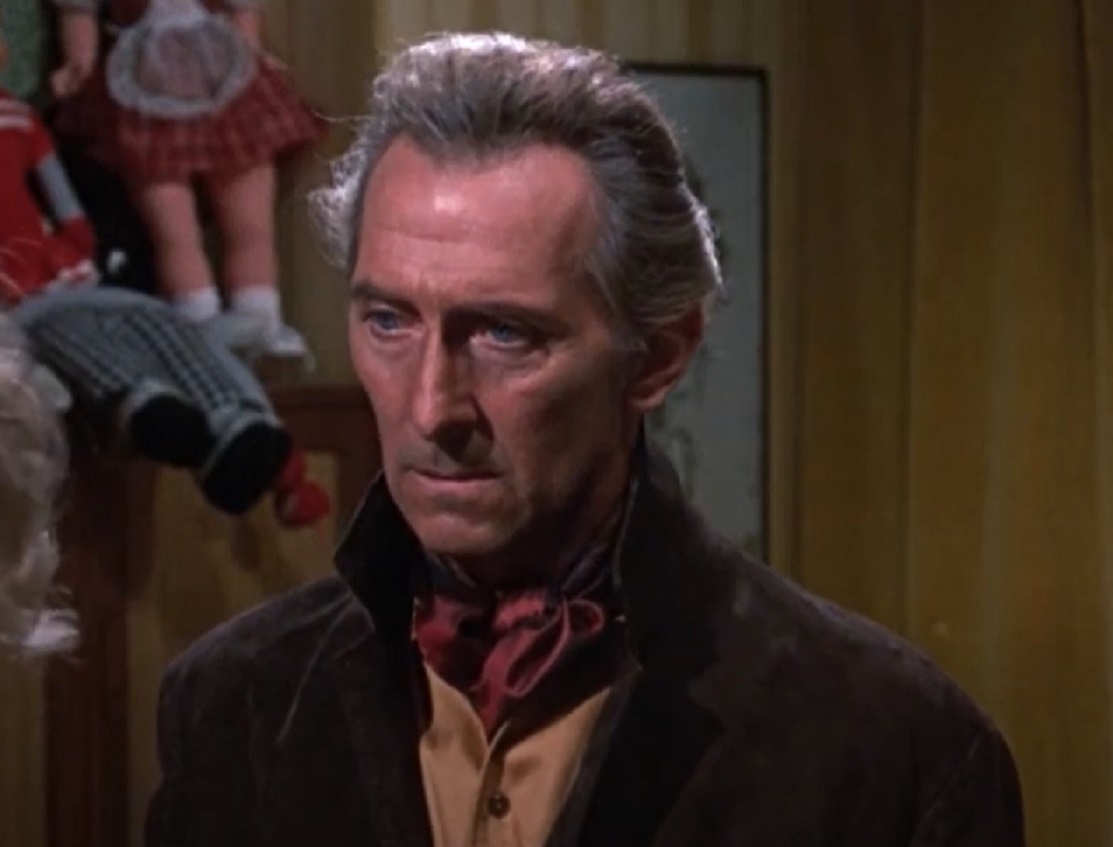Screenshot of Peter Cushing in brown jacket is looking down - from Corruption (1968)