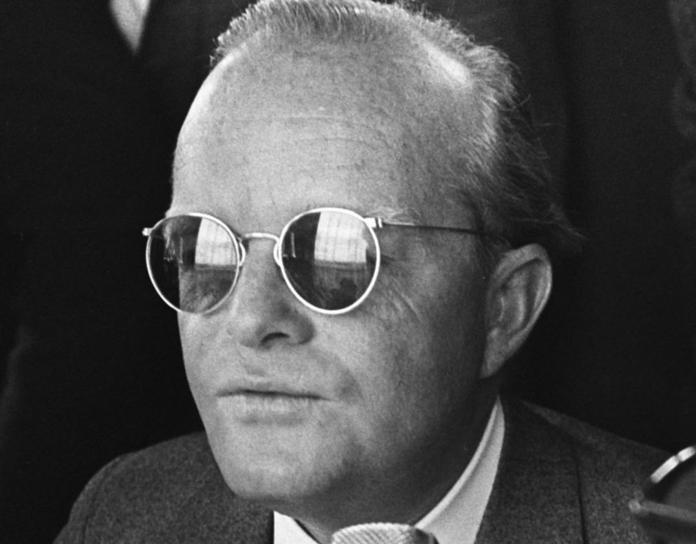 Grayscale Portrait Photo Of The Writer Truman Capote wearing sunglasses