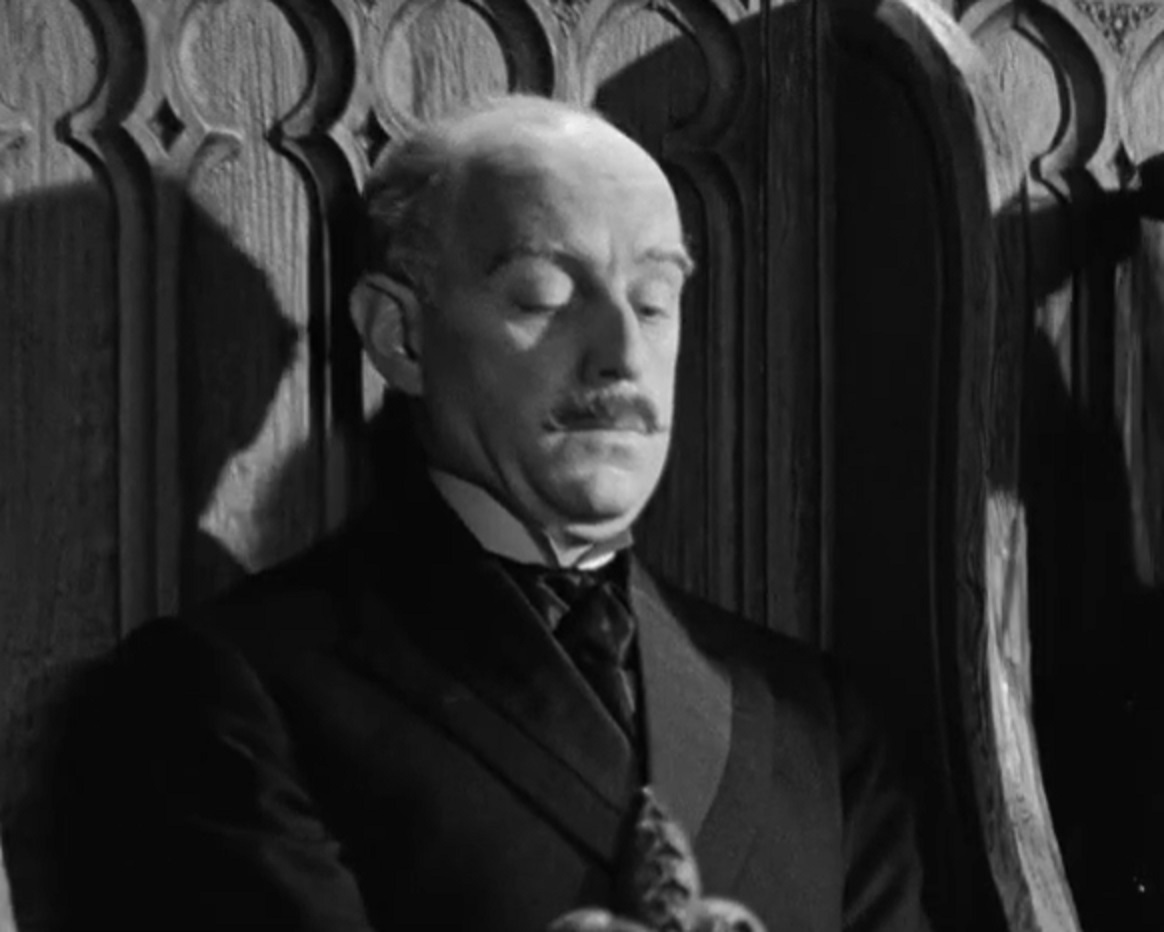 Screenshot of Alec Guinness looking down - from Kind Hearts And Coronets (1949)